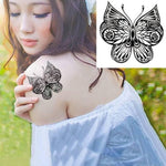 Tatouage papillon noir et blanc sur épaule femme - Rêve de Papillon