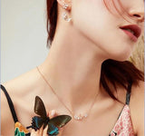 Collier Papillon en Or avec Fleur Blanche - Rêve de Papillon