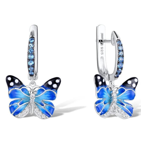 Boucles d'oreilles pour enfant en argent papillon bleu et fermoir poussette Boucles d'oreilles pour enfant en argent papillon bleu et fermoir poussette