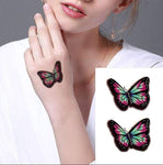 Tatouage éphémère papillon 3D fantaisie sur main femme- Rêve de Papillon