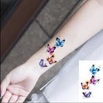 Tatouage éphémère papillon aquarelle sur avant bras - Rêve de Papillon