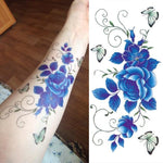 Tatouage éphémère papillon fleur bleue avant bras - Rêve de Papillon