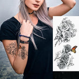 Tatouage éphémère papillon monarque et rose sur avant bras - Rêve de Papillon