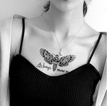 Tatouage éphémère papillon sphinx tête de mort sur poitrine - Rêve de Papillon